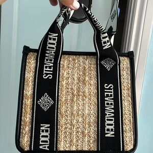 Steve Madden New purse. Removal strap. Black/white and tan color